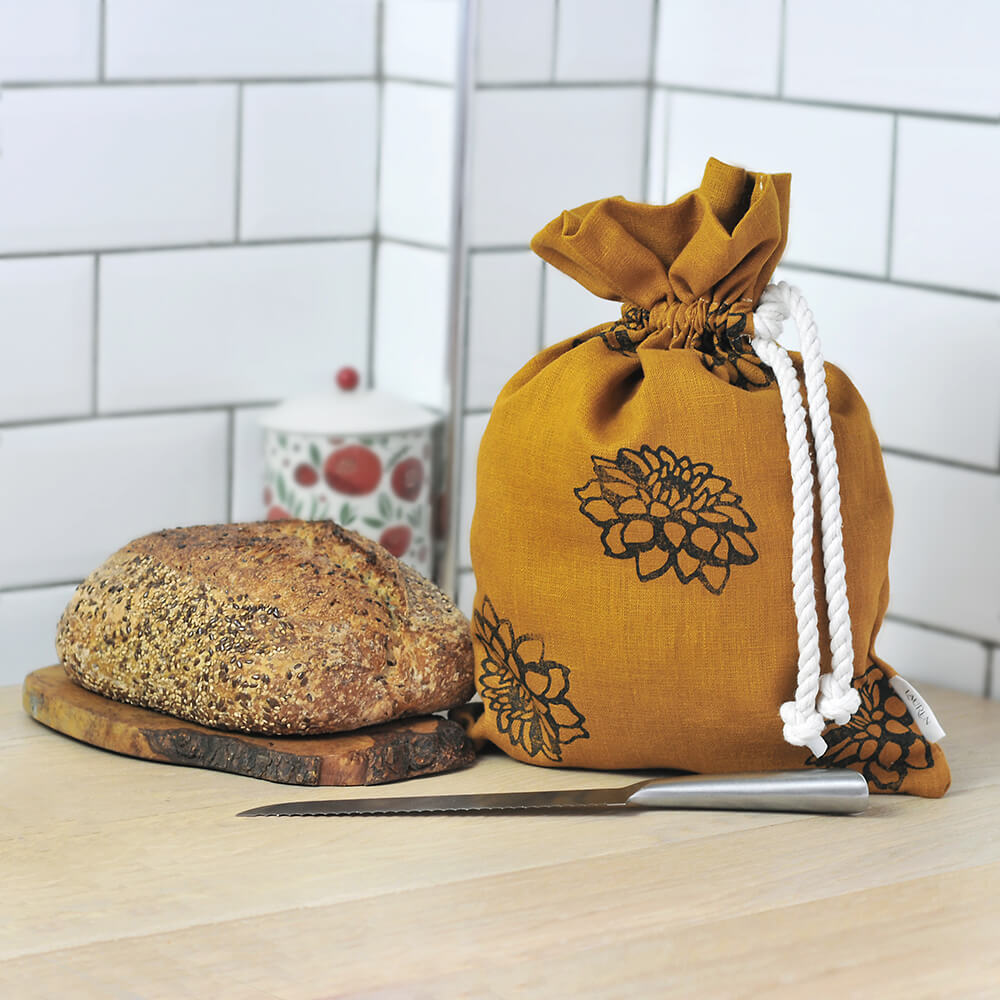 Mustard dahlia linen bread bag with sourdough by Lauren Holloway