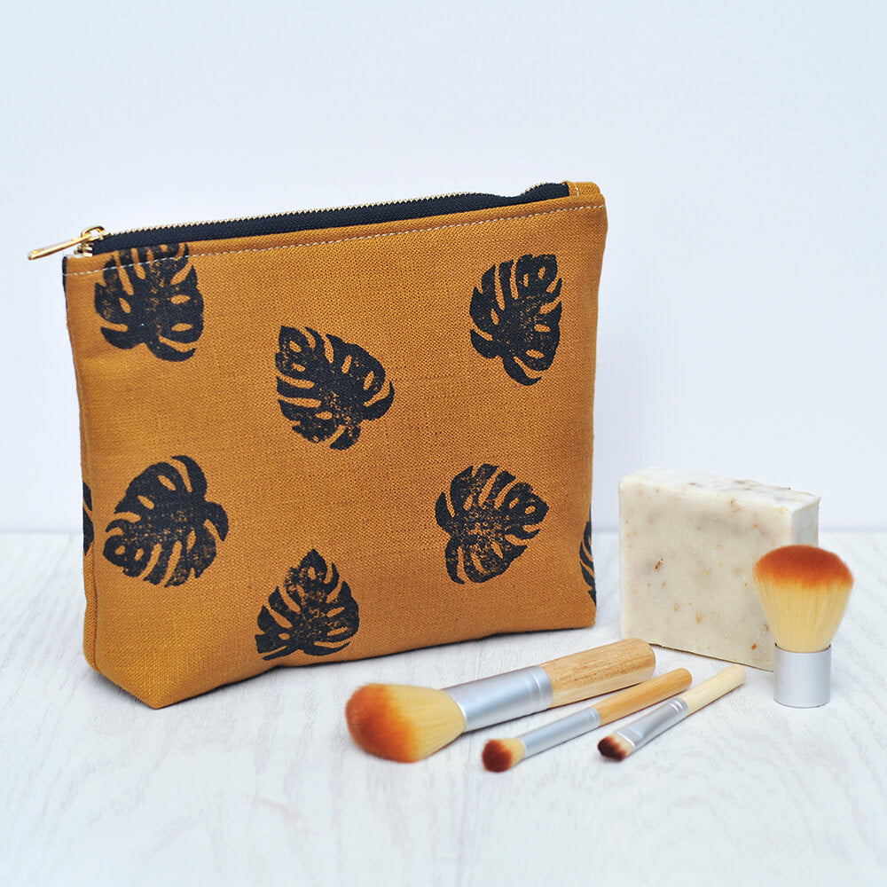 Handprinted linen make up bag by Lauren Holloway