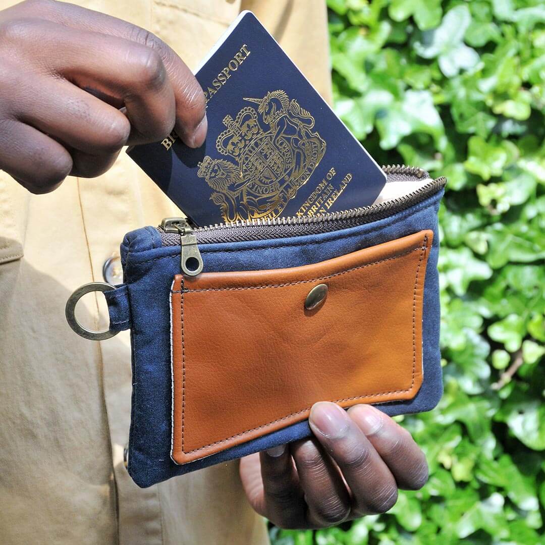 Recycled leather travel and passport pouch. Handmade gifts for the travel lover and globe trotter. Made by Lauren Holloway, sustainable bags and accessories made in the uk