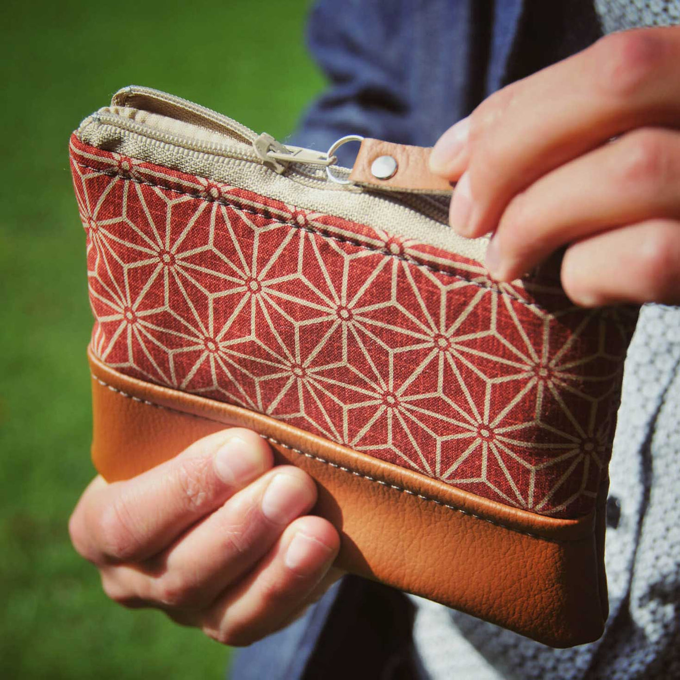Hand opening recycled leather coin purse