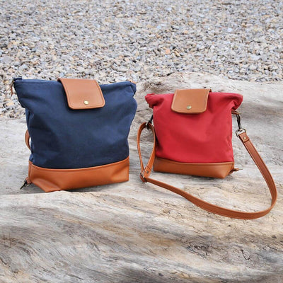 Navy and red wax canvas and recycled leather convertible backpack and crossbody 